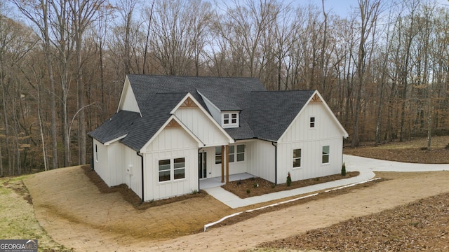 modern inspired farmhouse with a porch