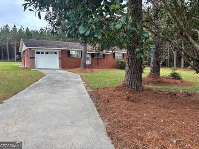 single story home featuring a garage and a front lawn