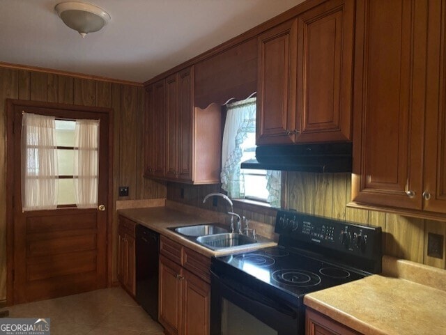 kitchen featuring sink and black appliances