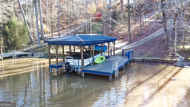 dock area featuring a water view