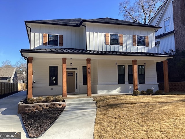 modern inspired farmhouse with covered porch