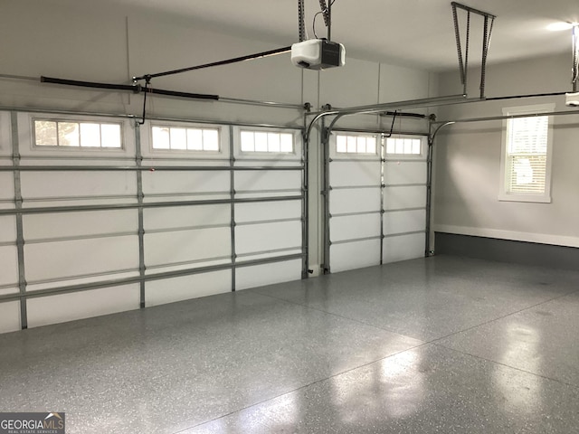 garage featuring a garage door opener