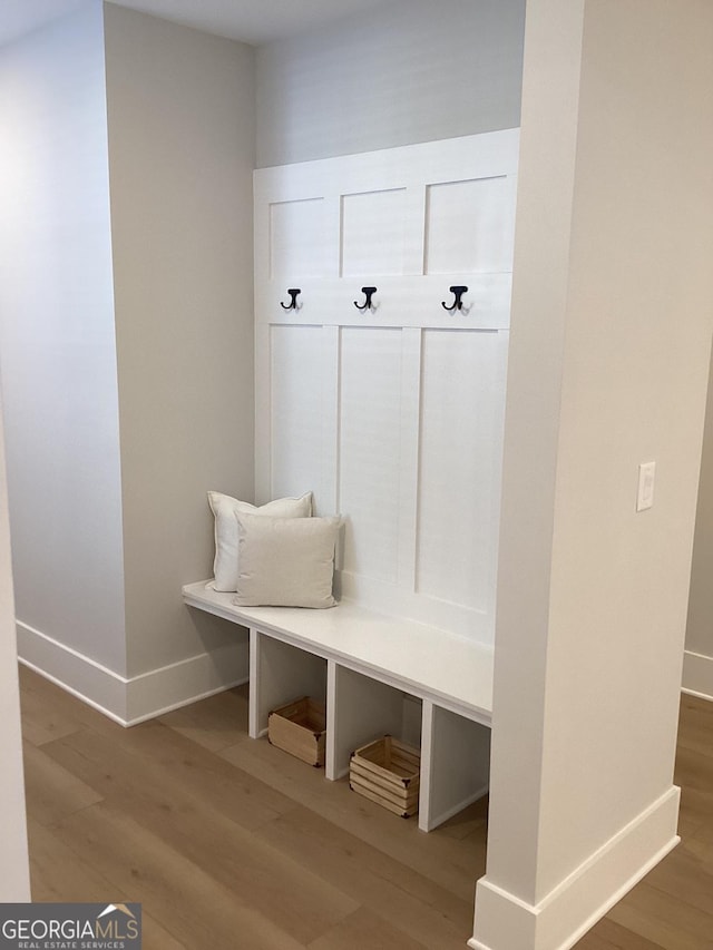 mudroom featuring wood-type flooring