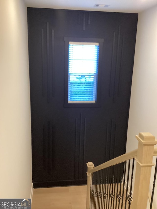 doorway to outside featuring hardwood / wood-style flooring