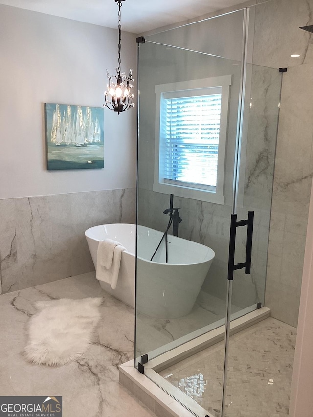 bathroom featuring tile walls and plus walk in shower