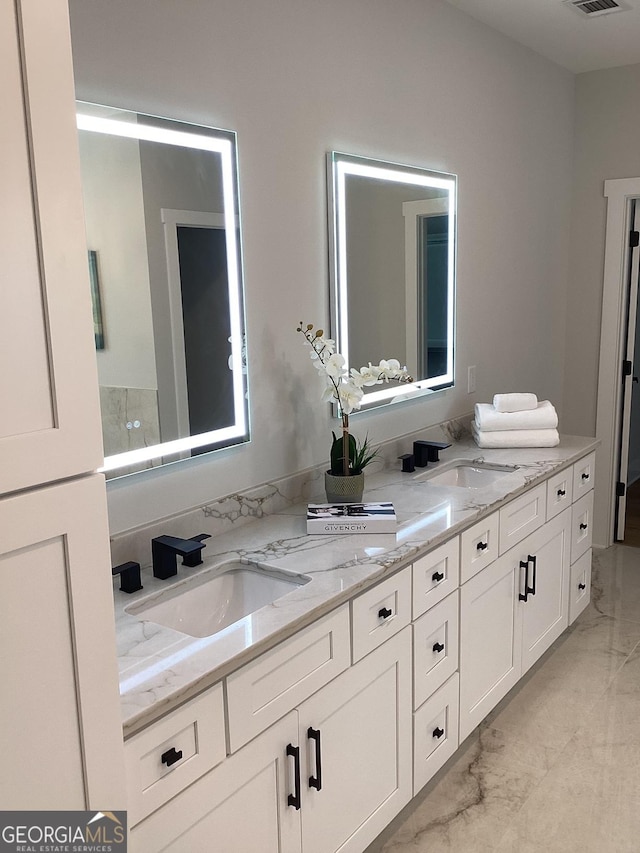 bathroom featuring vanity