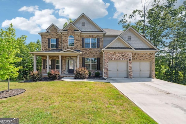 craftsman house with a front lawn, a porch, and a garage