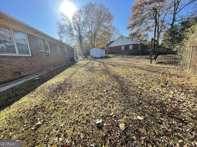 view of yard with a shed