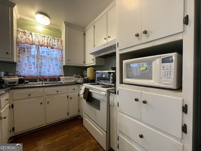 kitchen with white cabinets, dark wood-type flooring, and white appliances