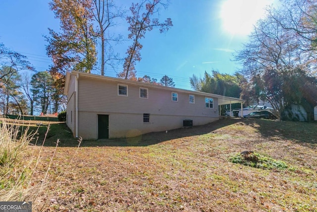 8775 Lee Rd, Lithia Springs, GA 30122 - back of house featuring a yard