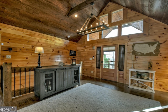 interior space featuring wooden ceiling, dark hardwood / wood-style floors, pendant lighting, vaulted ceiling, and wooden walls