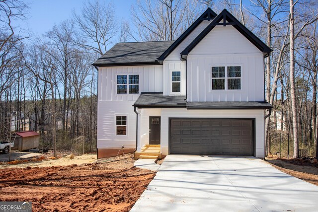 modern farmhouse style home with a garage