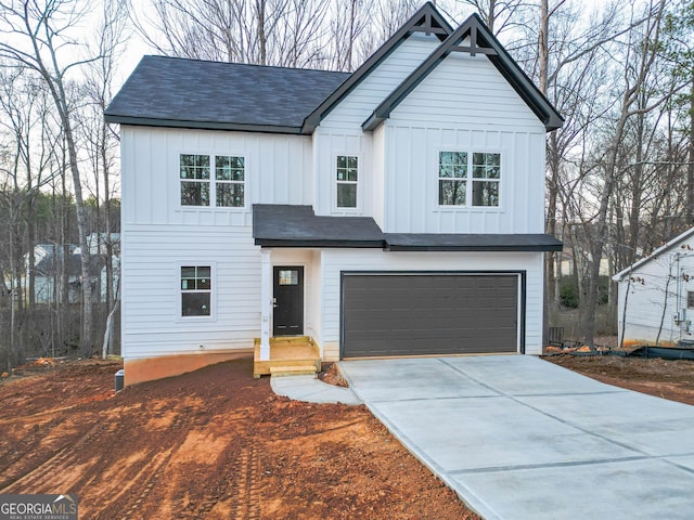 view of front of home with a garage