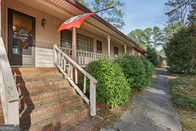 view of home's exterior featuring covered porch