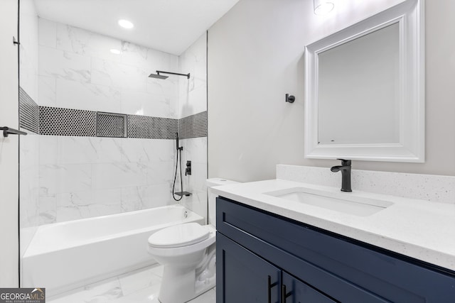 full bathroom with tiled shower / bath combo, toilet, and vanity