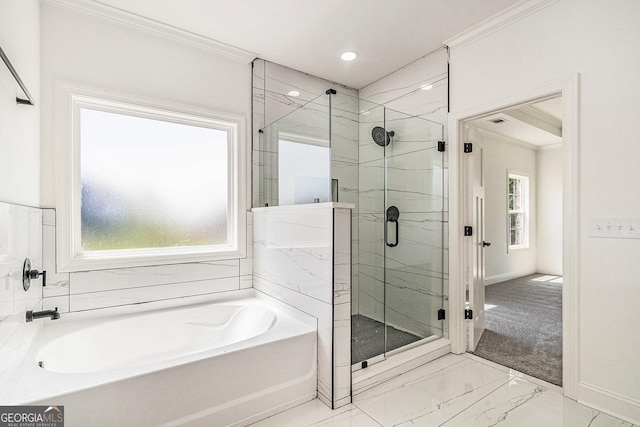 bathroom featuring separate shower and tub and crown molding