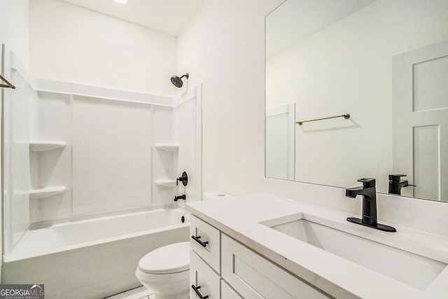 full bathroom featuring vanity, toilet, and tiled shower / bath