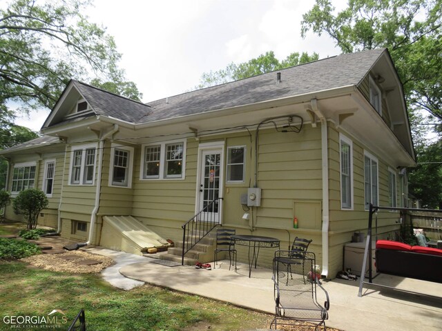 rear view of property with a patio area