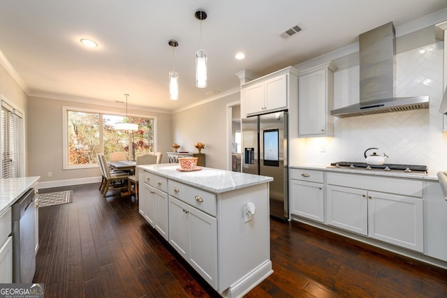 1560 Tapestry Rdg, Lawrenceville, GA 30045 - kitchen with appliances with stainless steel finishes, wall chimney range hood, crown molding, a center island, and dark wood-type flooring