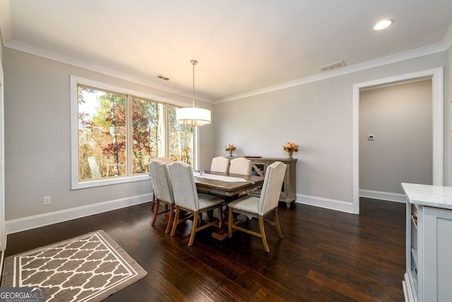 1560 Tapestry Rdg, Lawrenceville, GA 30045 - dining area featuring dark wood-style floors, crown molding, and recessed lighting