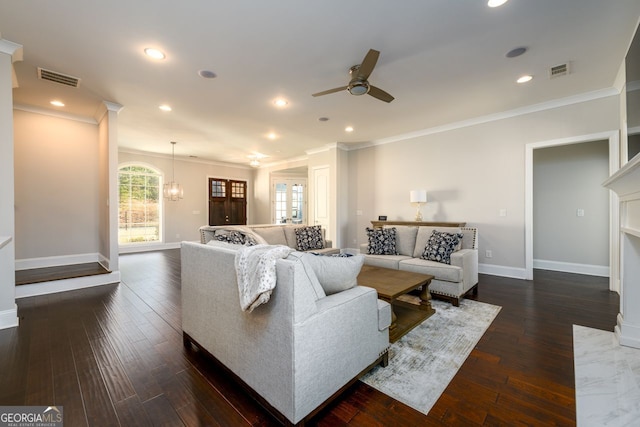 1560 Tapestry Rdg, Lawrenceville, GA 30045 - living room with a ceiling fan, ornamental molding, dark wood-style flooring, recessed lighting, and a chandelier