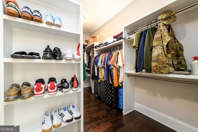 1560 Tapestry Rdg, Lawrenceville, GA 30045 - walk in closet featuring hardwood / wood-style floors