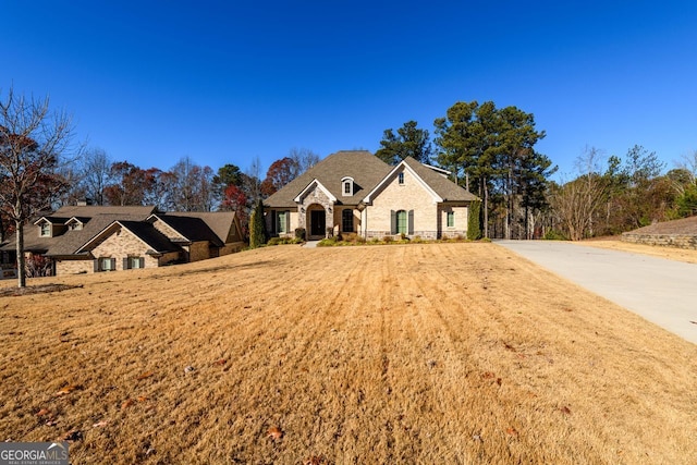 1560 Tapestry Rdg, Lawrenceville, GA 30045 - view of front of house with stone siding