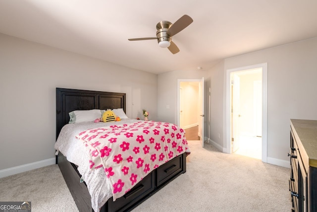 1560 Tapestry Rdg, Lawrenceville, GA 30045 - bedroom featuring light colored carpet, ceiling fan, and ensuite bathroom