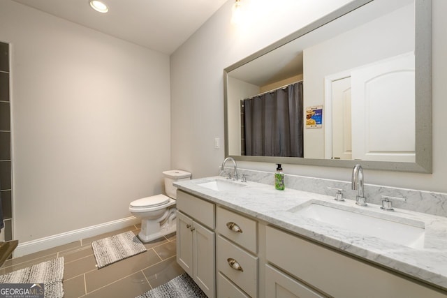 1560 Tapestry Rdg, Lawrenceville, GA 30045 - full bath with double vanity, recessed lighting, tile patterned floors, and a shower with curtain