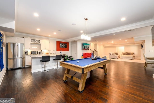 1560 Tapestry Rdg, Lawrenceville, GA 30045 - rec room with billiards, dark wood finished floors, crown molding, recessed lighting, and a raised ceiling