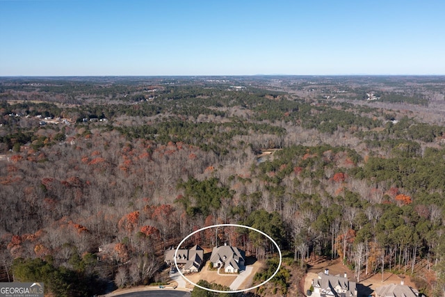 1560 Tapestry Rdg, Lawrenceville, GA 30045 - aerial view of property and surrounding area with a heavily wooded area
