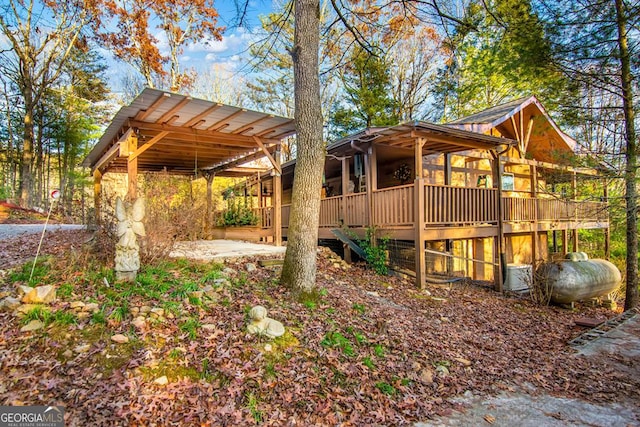 view of side of home featuring a deck