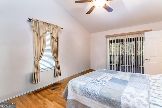 284 Tickanetley Rd, Ellijay, GA 30536 - bedroom with vaulted ceiling, wood finished floors, and ceiling fan