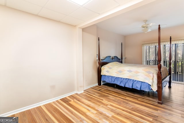 284 Tickanetley Rd, Ellijay, GA 30536 - bedroom with light wood-style flooring, baseboards, and a ceiling fan