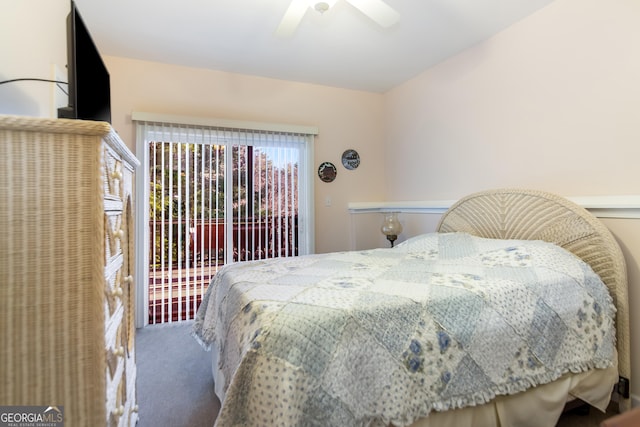 bedroom with access to exterior, carpet flooring, and a ceiling fan