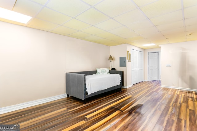 284 Tickanetley Rd, Ellijay, GA 30536 - bedroom featuring wood finished floors, baseboards, a paneled ceiling, and a closet