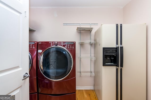 284 Tickanetley Rd, Ellijay, GA 30536 - washroom with washing machine and clothes dryer and wood finished floors