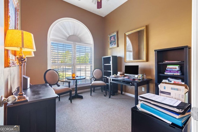 office area featuring ceiling fan and carpet