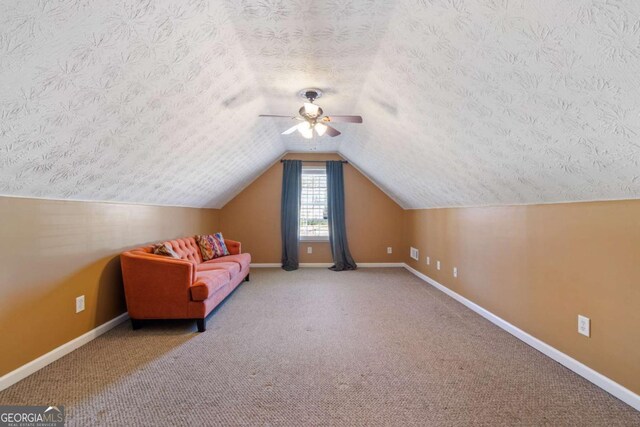 exercise room with ceiling fan