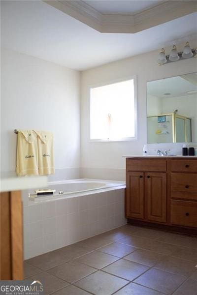 bathroom featuring crown molding, tile patterned flooring, vanity, and shower with separate bathtub