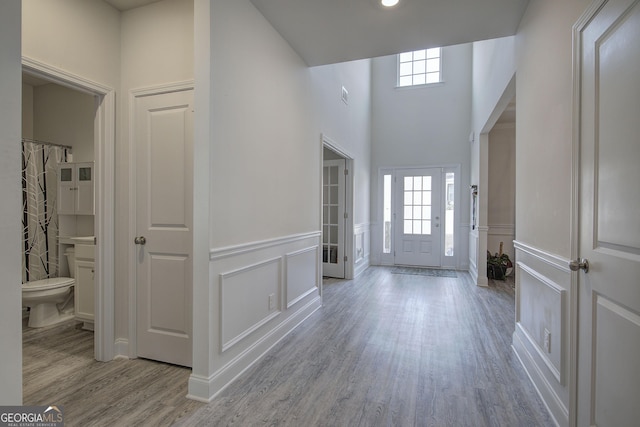 foyer entrance with light wood-type flooring