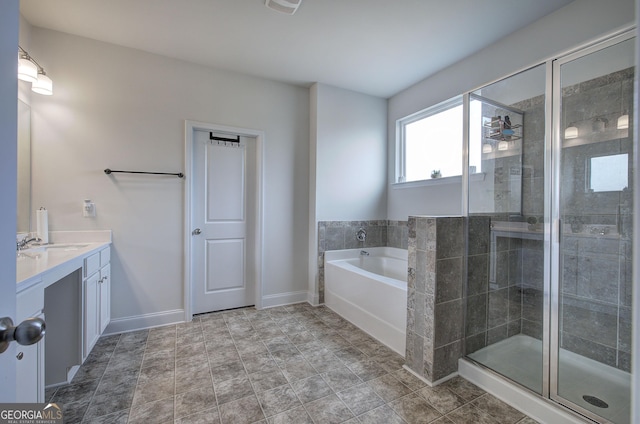 bathroom featuring independent shower and bath and vanity