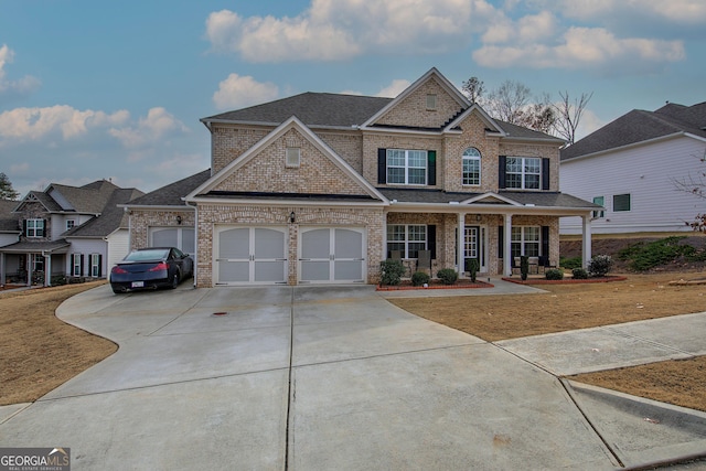 craftsman house featuring a garage and covered porch