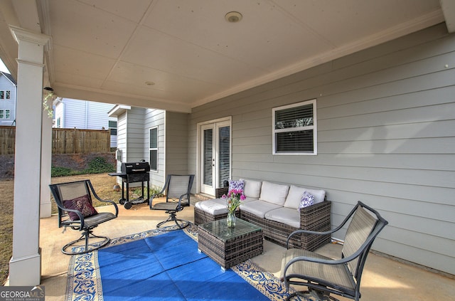 view of patio featuring an outdoor living space and a grill