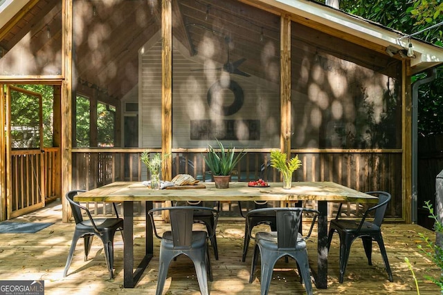 sunroom with vaulted ceiling