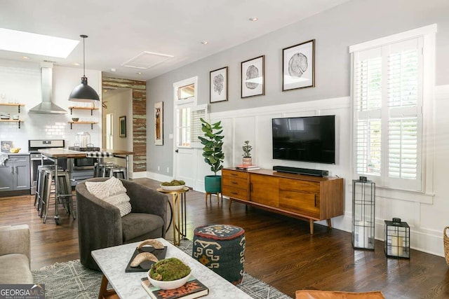 living room featuring dark hardwood / wood-style flooring