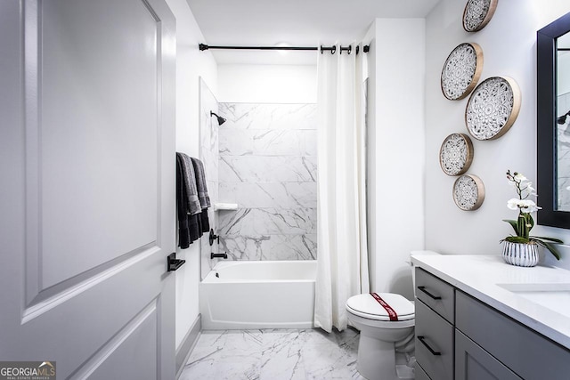 full bathroom with vanity, shower / tub combo, and toilet