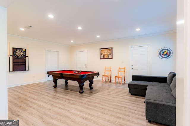 playroom featuring crown molding, light hardwood / wood-style floors, and pool table