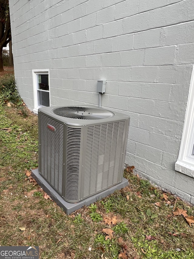 exterior details featuring cooling unit