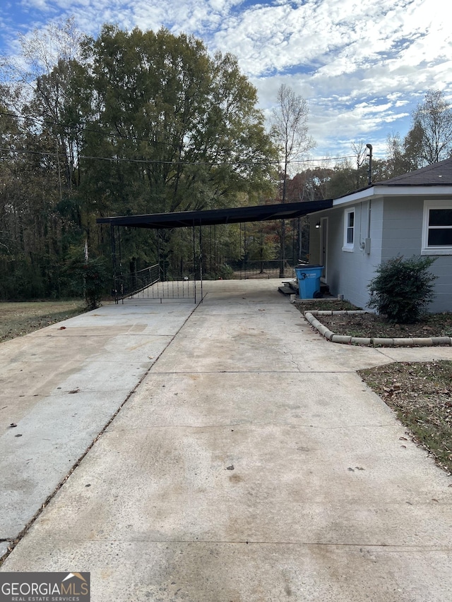 view of patio / terrace featuring a carport